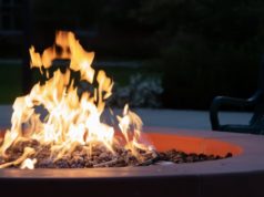 How to Use Brick Veneer to Create an Outdoor Kitchen Fire pit at night