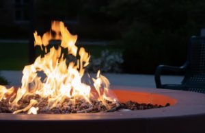 How to Use Brick Veneer to Create an Outdoor Kitchen Fire pit at night